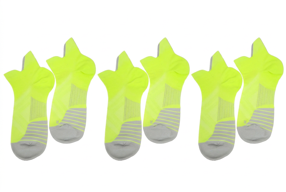 Three pairs of yellow no-show ankle compression socks