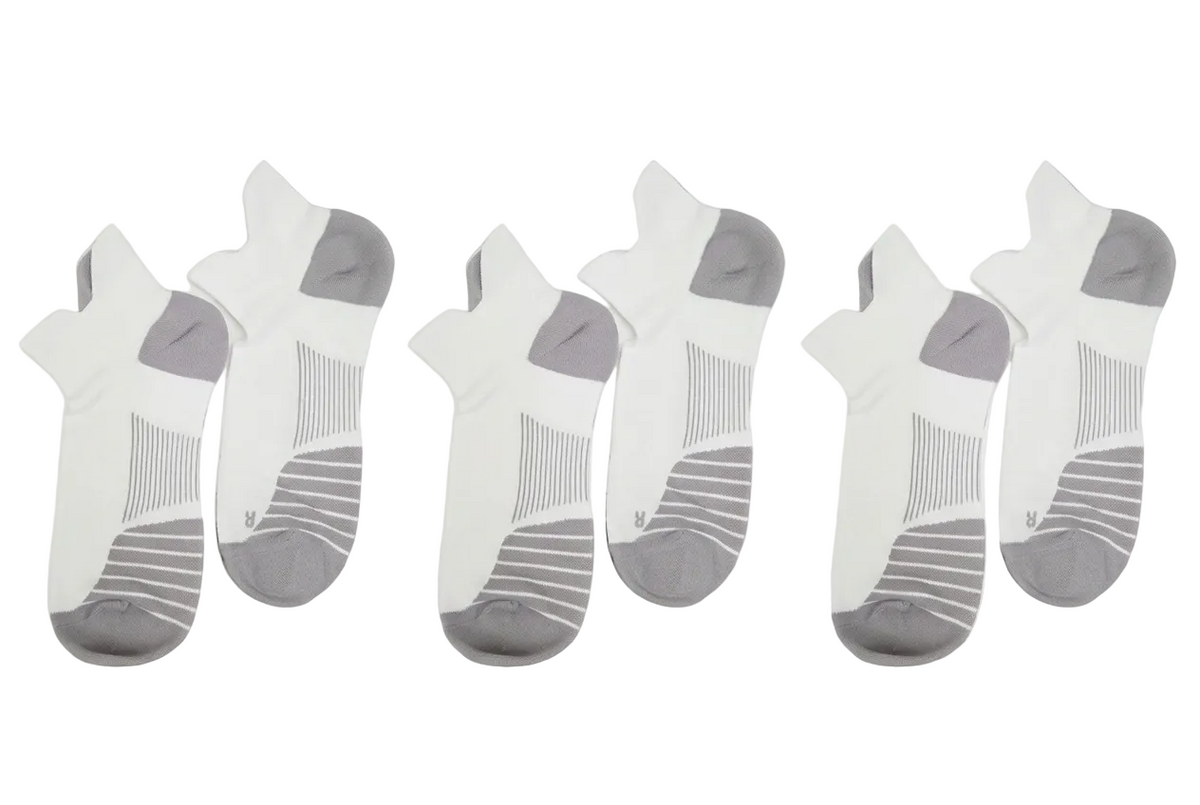 Three pairs of white no-show ankle compression socks
